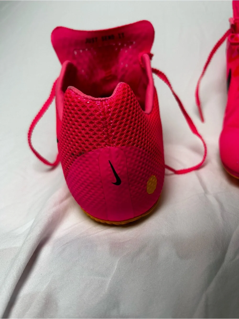 Nike Bright Pink Athletic track with Black Swoosh men’s 10/1/2